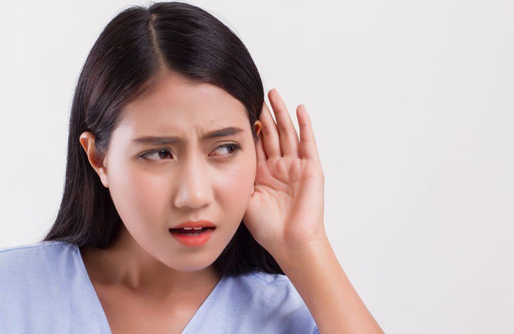 Women suffering from hard of hearing